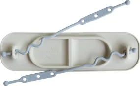 "Keep Toys off the Floor with Our Silicone Mini Suction Placemat for Babies & Toddlers | Adjustable Tethers and Travel Sleeve Included | Dishwasher Safe and BPA Free | Available in Tan"